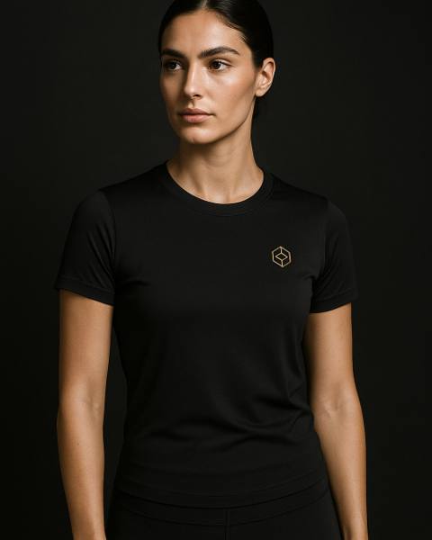 Studio Tee — fitted training tee with gold chest mark